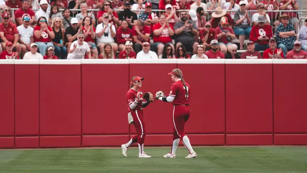 Abby Dayton and Kasidi Pickering in the outfield during Super Regionals