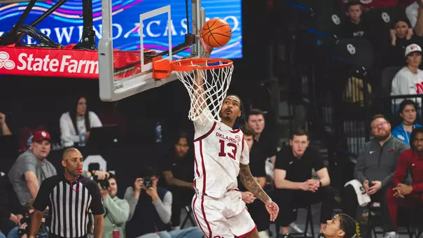 Tae Davis goes up for a dunk in a game against Arkansas