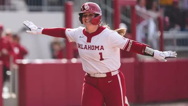 Kendall Wells rounding third base