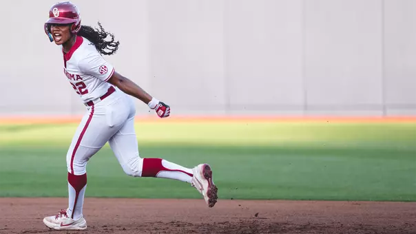 Kai Minor rounding the bases after hitting a home run