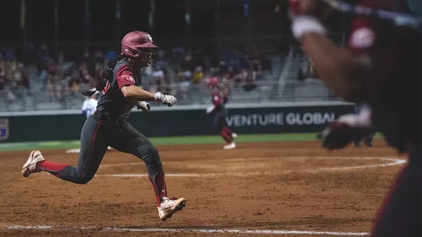 Ailana Agbayani running home during OU's 3-2 win at LSU