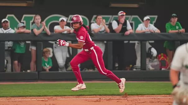Kai Minor running home on a sac fly at North Texas