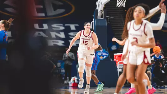 Reagan Beers running down court smiling