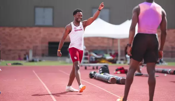 Kennedy Stringfellow celebrates after his NCAA-leading long jump mark at the John Jacobs Invitational.