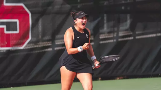 Julia Garcia Ruiz celebrates after winning a point against Texas A&M.