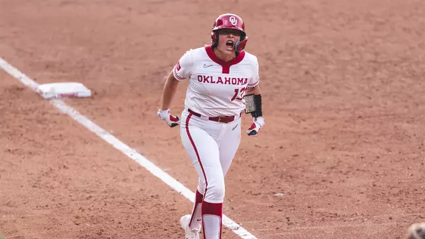 Isabela Emerling rounding third base after a grand slam against Arkansas