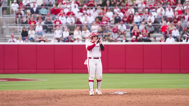 Kendall Wells clapping at second base