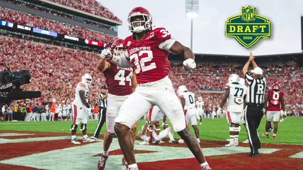 R Mason Thomas action photo - celebrating game-sealing safety vs. Auburn at Gaylord Family - Memorial Stadium on Sept. 20, 2025 with 2026 NFL Draft logo in top right corner