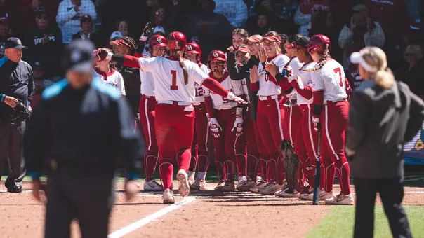 Kendall Wells rounding third base after a home run against Kentucky