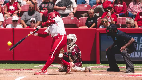 Kendall Wells swings and hits one of her two home runs against Mississippi State