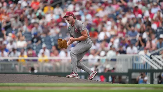 Cord Rager celebrates after an out on the mound in OU's College World Series game against Alabama