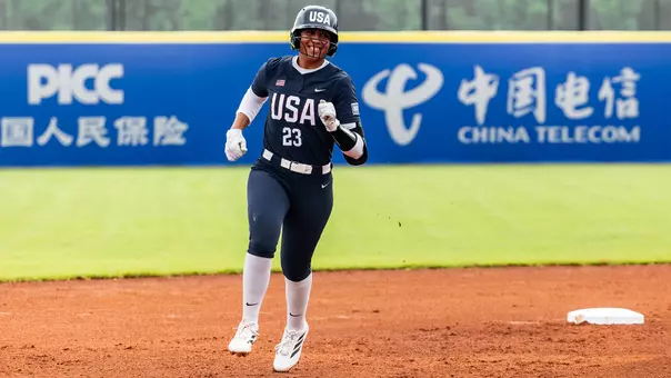 Tiare Jennings rounding the bases after hitting a home run against Japan in the 2025 WBSC