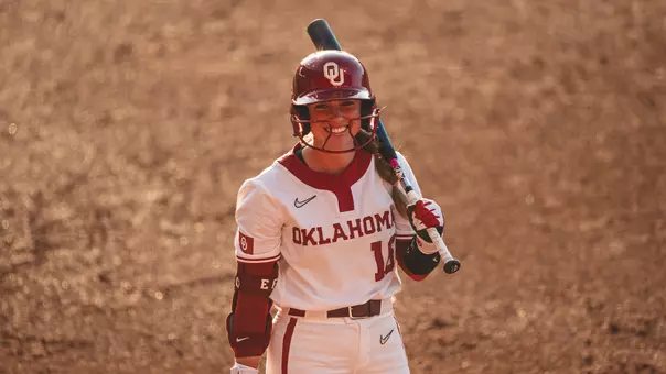 Abby Dayton smiling during an at-bat