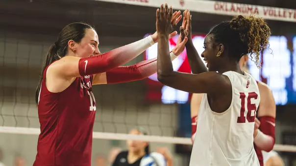Mikala Young and Aniya Warren high five