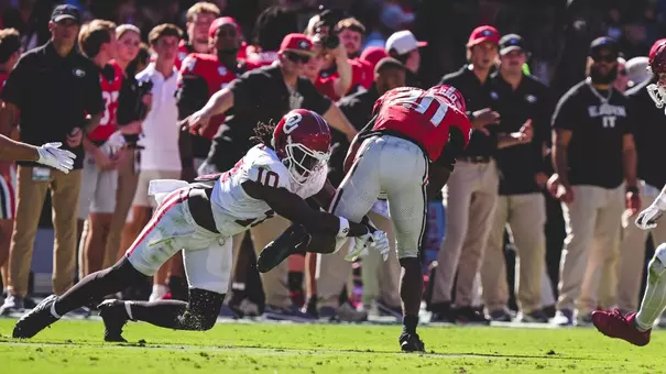 Linebacker Kip Lewis makes a tackle in Oklahoma football's game at No. 2 Georgia on Saturday, Sept. 26 at Sanford Stadium in Athens, Ga.