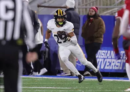 Southern Miss Golden Eagles defensive back Camron Harrell (29) returns the kick off in a game against La Tech (Joe Harper/bgnphoto.com)