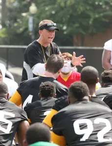 Todd Monken addresses team.
