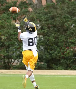 Kyle Foster goes after a catch during practice earlier this week.