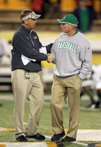 Head coach Todd Monken and Marshall Thundering Herd head coach Doc Holiday. (Credit: Chuck Cook-USA TODAY Sports)