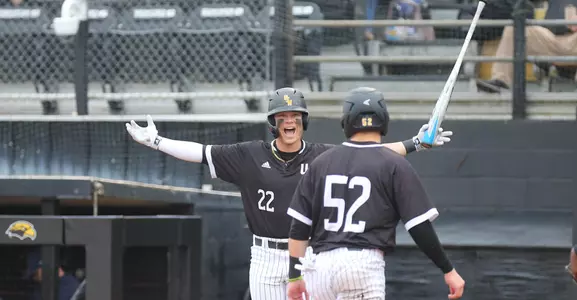 Baseball vs Murray State -Sunday 2-16-20Charlie Fischer and Brant Blaylock celebrate a run scored.