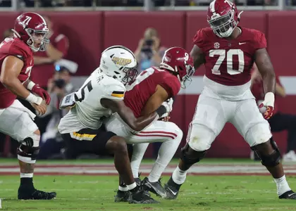 Southern Miss Golden Eagles defensive lineman Josh Carr Jr. (45) sacks the quarterback against Alabama Crimson Tide. Saturday, Sept. 25, 2021 (Photo by Joe Harper/BigGold Photography)