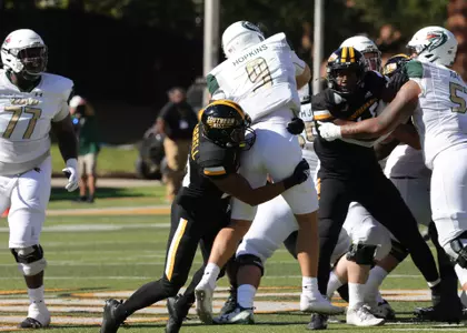 Southern Miss Golden Eagles defensive back Camron Harrell (29) gets a hit on UAB Blazers quarterback Dylan Hopkins (9) against UAB Blazers. Saturday, Oct. 16, 2021 (Photo by Joe Harper/BigGold Photography)