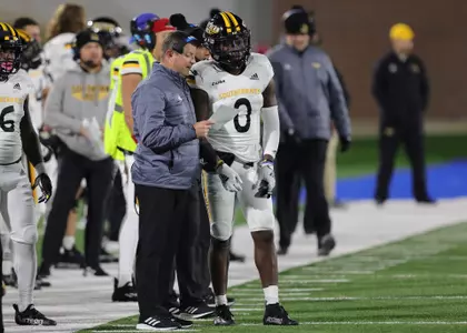 Southern Miss Golden Eagles wide receiver Demarcus Jones (0) talks to Southern Miss Golden Eagles head coach Will Hall in a game against La Tech (Joe Harper/bgnphoto.com)