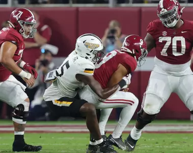 Southern Miss Golden Eagles defensive lineman Josh Carr Jr. (45) sacks the quarterback against Alabama Crimson Tide. Saturday, Sept. 25, 2021 (Photo by Joe Harper/BigGold Photography)