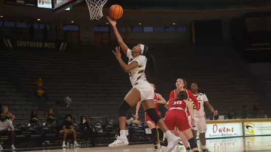 Southern Miss Lady Eagles forward Femi Funeus (15) with a lay up in a game between the Southern Miss Golden Eagles and the Nicholls Colonels. November 25, 2022 (Joe Harper/bgnphoto.com)