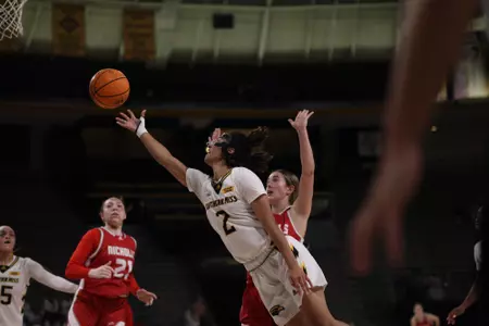 Domonique Davis (2) in action against Nicholls