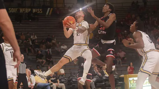 Men's Basketball action vs William Carey