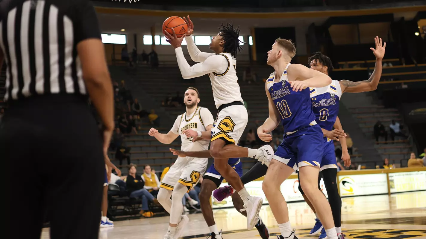 Southern Miss Golden Eagles guard Mo Arnold (3) with a lay up in a game between the Southern Miss Golden Eagles and the McNeese State Cowboys. December 18, 2022 (Joe Harper/bgnphoto.com)