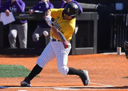 Southern Miss. outfielder Gabriel Montenegro (14) gets a hit in a game against North Alabama. Friday, Feb 18, 2022  (Photo by Joe Harper/BigGold Photography)