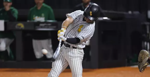 Southern Miss. outfielder Reece Ewing (38) hits a home run in a game against Tulane . Wednesday March 09, 2022  (Photo by Joe Harper/BigGold Photography)