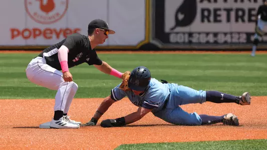 Southern Miss. infielder Dustin Dickerson (10) tags out Old Dominion outfielder Thomas Wheeler (27) on a steal attempt in a game against Old Dominion. Sunday May 08, 2022 (Photo by Joe Harper/BigGold Photography)