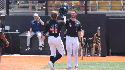 Southern Miss. first baseman Christopher Sargent (41) and Southern Miss. outfielder Slade Wilks (7) celebrate the home run in a game between the Southern Miss Golden Eagles and the UTSA Roadrunners. Sunday May 14, 2022  (Photo by Joe Harper/BigGold Photography)