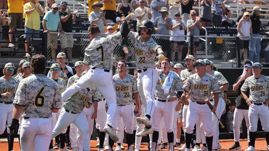 Southern Miss. outfielder Slade Wilks (7) and Southern Miss. infielder Charlie Fischer (22) celebrate the home run in a game against old Dominion. Saturday May 07, 2022 (Photo by Joe Harper/BigGold Photography)