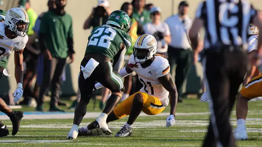 Southern Miss Golden Eagles safety Jay Stanley (21) sets up to tackle Tulane Green Wave running back Tyjae Spears (22) in a game between the Southern Miss Golden Eagles and the Tulane. Saturday, September 24, 2022 (Photo by Joe Harper/BigGold Photinography)