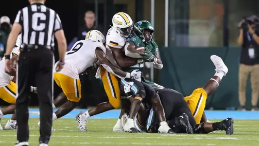 Southern Miss Golden Eagles defensive back Malik Shorts (9) stops Tulane Green Wave running back Tyjae Spears (22) in a game between the Southern Miss Golden Eagles and the Tulane. Saturday, September 24, 2022 (Photo by Joe Harper/BigGold Photinography)