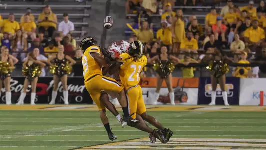 Southern Miss Golden Eagles linebacker Tyrese Hopkins (24) and Southern Miss Golden Eagles defensive back Camron Harrell (29) break up the pass in a game between the Southern Miss Golden Eagles and the Liberty Flames. Saturday, September 3, 2022 (Photo by Joe Harper/BigGold Photinography)