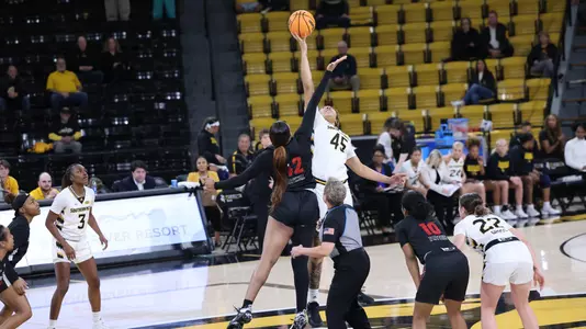 Southern Miss Lady Eagles center Melyia Grayson (45) controls the tip in a game between the Southern Miss Golden Eagles and the Arkansas State Red Wolves . January 05, 2023 (Joe Harper/bgnphoto.com)