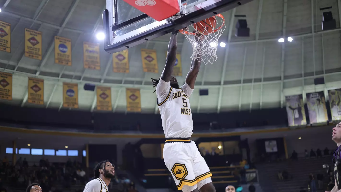 Southern Miss Golden Eagles forward DeAndre Pinckney (5) with a slam dunk in a game between the Southern Miss Golden Eagles and the James Madison Dukes . January 21, 2023 (Joe Harper/bgnphoto.com)