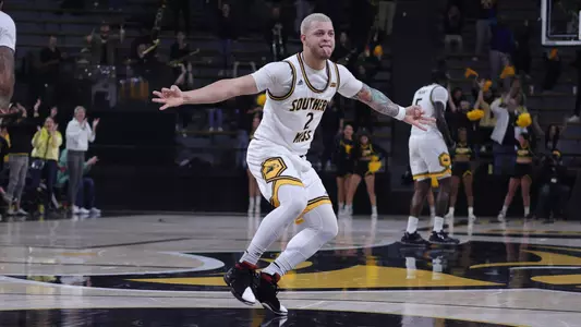 Southern Miss Golden Eagles guard Neftali Alvarez (2) celebrates the three point shot of Southern Miss Golden Eagles guard Austin Crowley (1) in a game between the Southern Miss Golden Eagles and the James Madison Dukes . January 21, 2023 (Joe Harper/bgnphoto.com)