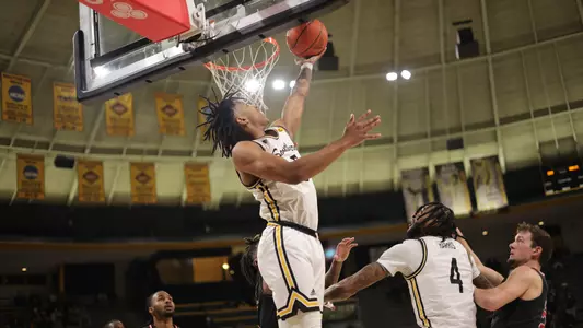 Southern Miss Golden Eagles guard Mo Arnold (3) with a reverse layup in a game between the Southern Miss Golden Eagles and the Arkansas State Red Wolves . January 26, 2023 (Joe Harper/bgnphoto.com)