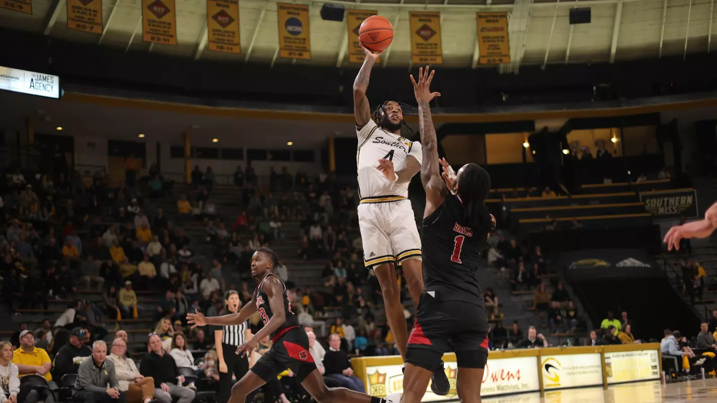 Southern Miss Golden Eagles forward Denijay Harris (4) getting up high over Arkansas State Red Wolves guard Markise Davis (1) in a game between the Southern Miss Golden Eagles and the Arkansas State Red Wolves . January 26, 2023 (Joe Harper/bgnphoto.com)
