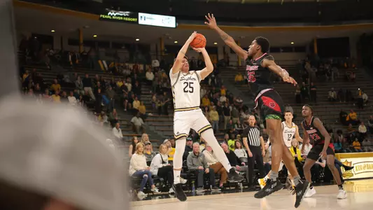 Southern Miss Golden Eagles guard Marcelo Perez (25) with a fade away jump shot in a game between the Southern Miss Golden Eagles and the Arkansas State Red Wolves . January 26, 2023 (Joe Harper/bgnphoto.com)