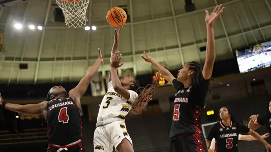 Southern Miss Lady Eagles guard Jacorriah Bracey (3) sinks the winning layup with 6 seconds left on the clock in a game between the Southern Miss Golden Eagles and the Louisiana Ragin Cajuns . January 05, 2023 (Joe Harper/bgnphoto.com)