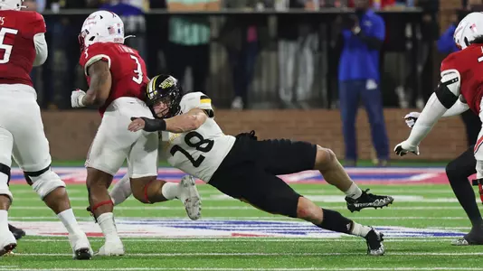 Southern Miss Golden Eagles linebacker Swayze Bozeman (28) puts a hit on South Alabama Jaguars running back La'Damian Webb (3) in a game between Southern Miss Golden Eagles and South Alabama Jaguars in the NCAA Football Game. October 17, 2023
(Joe Harper/bgnphoto.com)