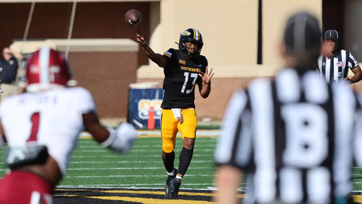 Southern Miss Golden Eagles quarterback Ethan Crawford (13) throws a pass in a game between the Southern Miss Golden Eagles vs Troy Trojans in the NCAA Football Game. November 24, 2023. (Joe Harper/bgnphoto.com)