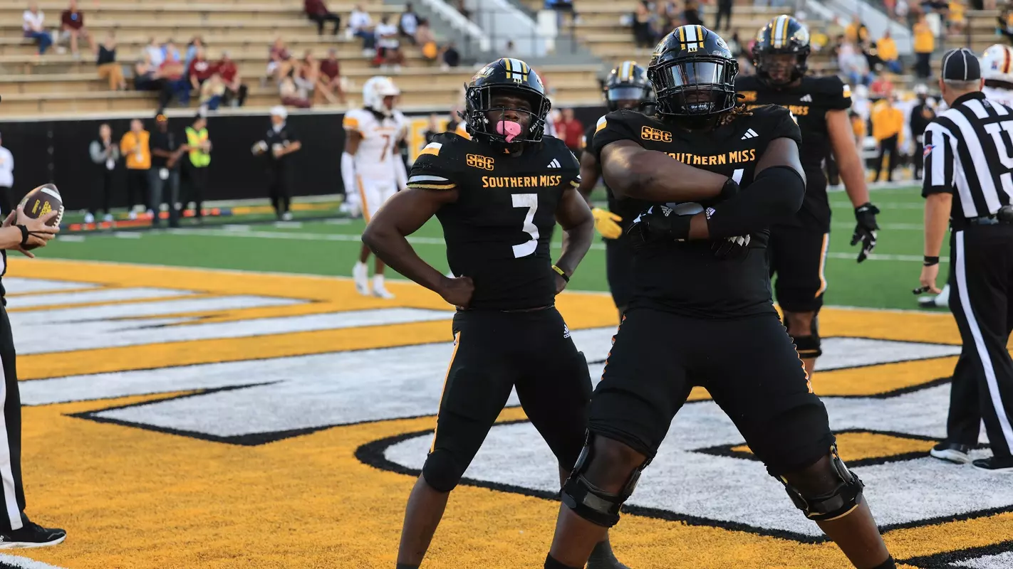 Southern Miss Golden Eagles running back Frank Gore Jr. (3) and Southern Miss Golden Eagles offensive lineman Kyron Barnes (64) celebrate the touchdown in a game between Southern Miss Lady Golden Eagles and Louisiana Warhawks in the NCAA Football Game. November 04, 2023 (Joe Harper/bgnphoto.com)